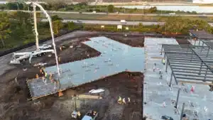 Aerial of a large commercial concrete pour and structural building pad in Southwest Florida